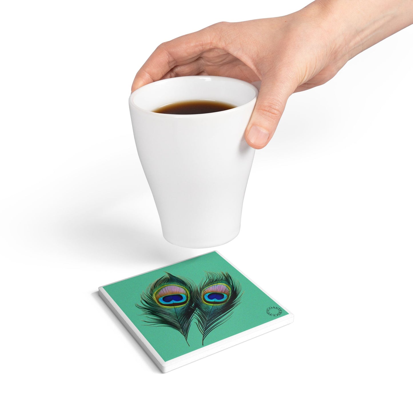 🪶 The Peacock Feather Ceramic Coaster – Elegant & Luminous